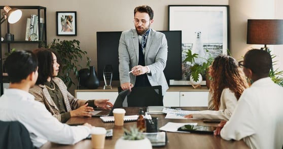 Training business people in office together for development and growth.