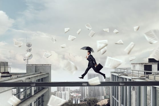 Fearless businessman overcoming difficulty.